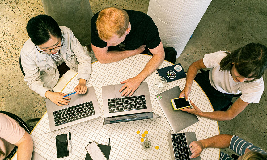 Creative team collaborating on marketing challenges